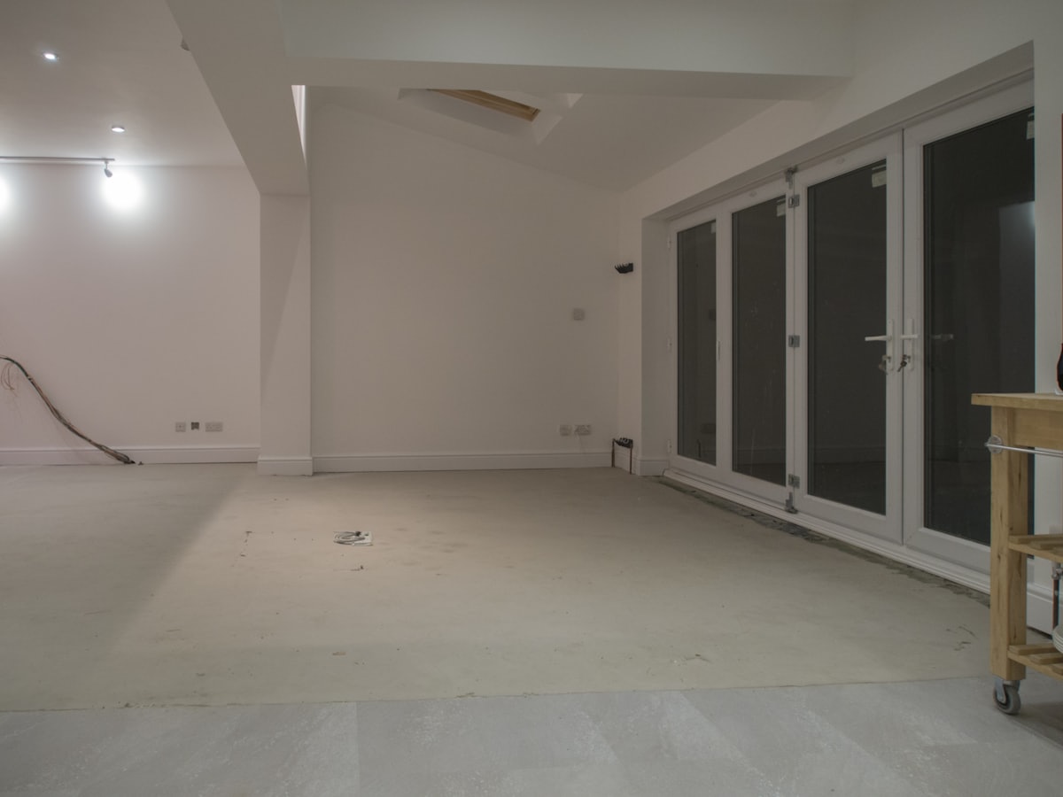 Empty room with freshly painted white walls