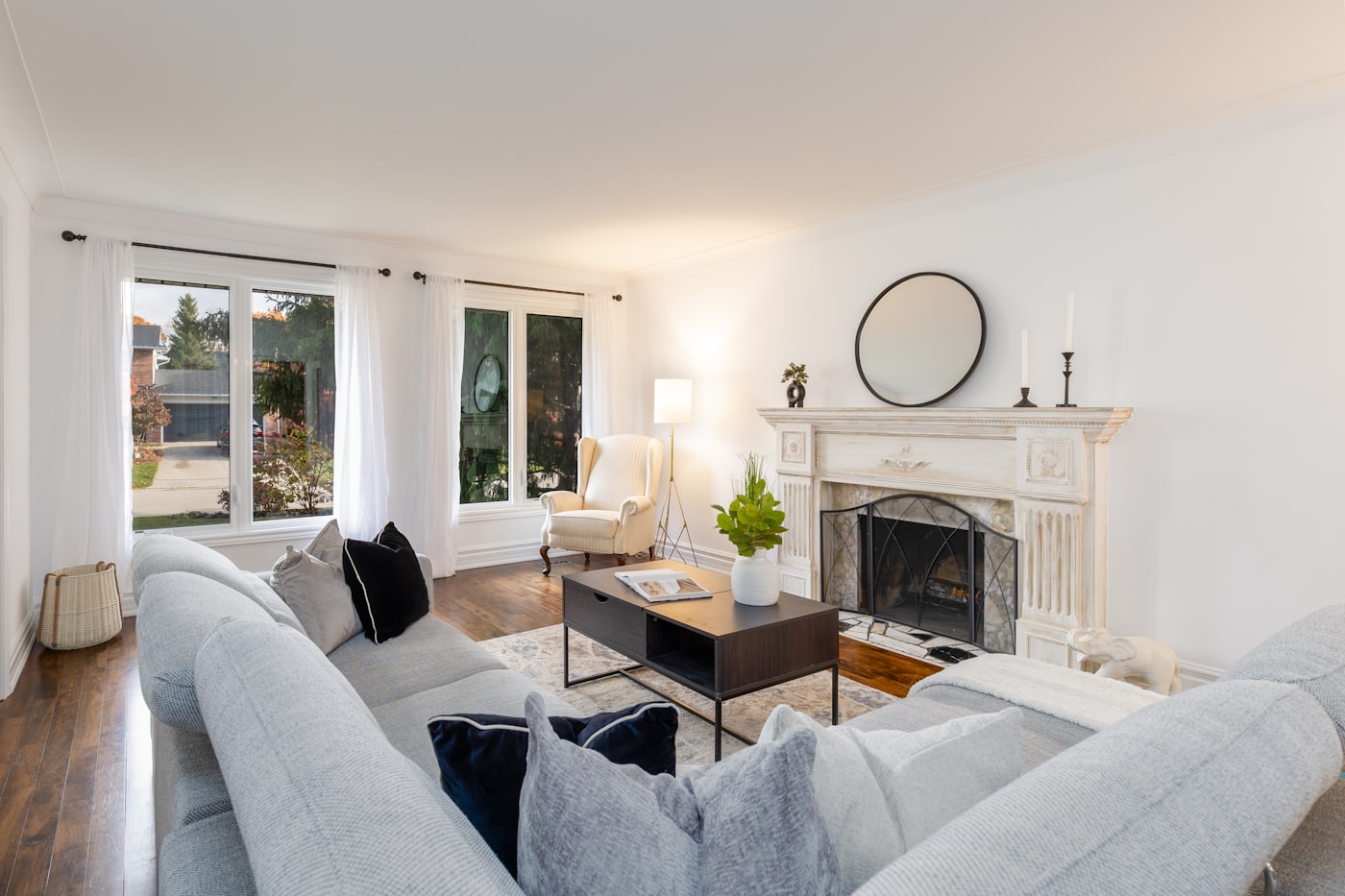 Bright living room with a freshly painted fireplace wall